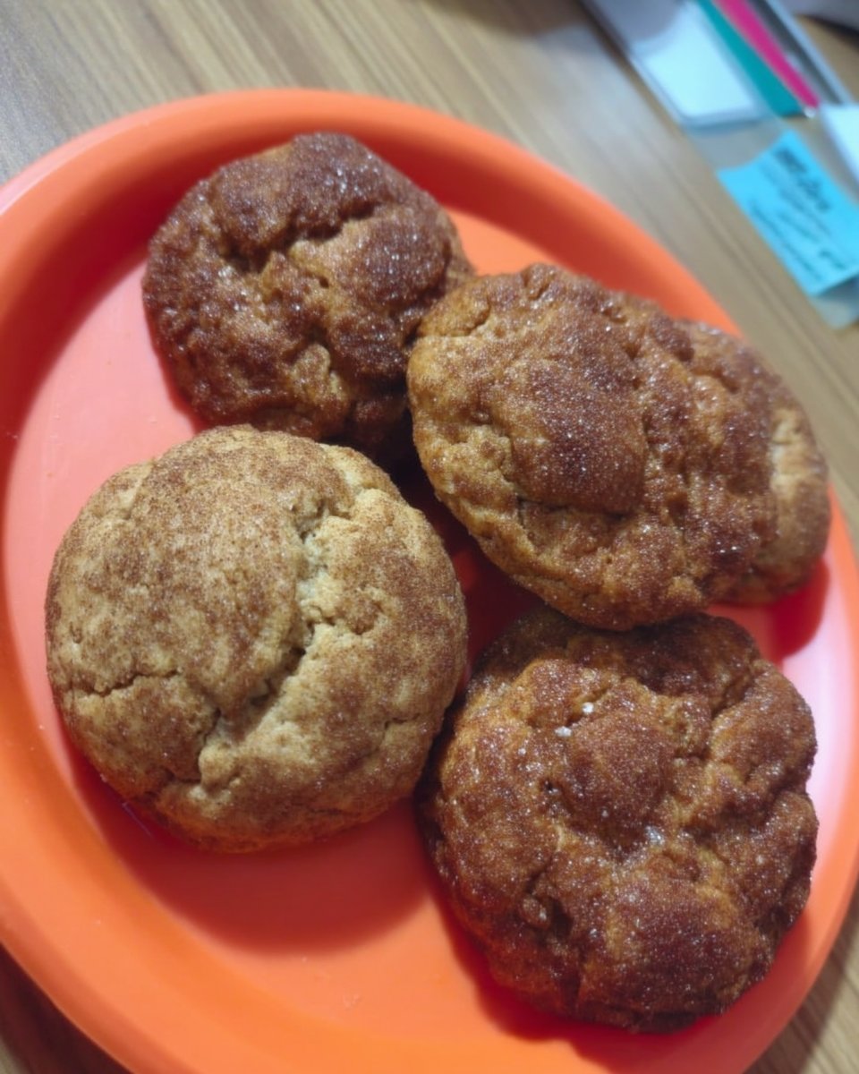 Stack of soft gluten free snickerdoodles with cinnamon sugar coating