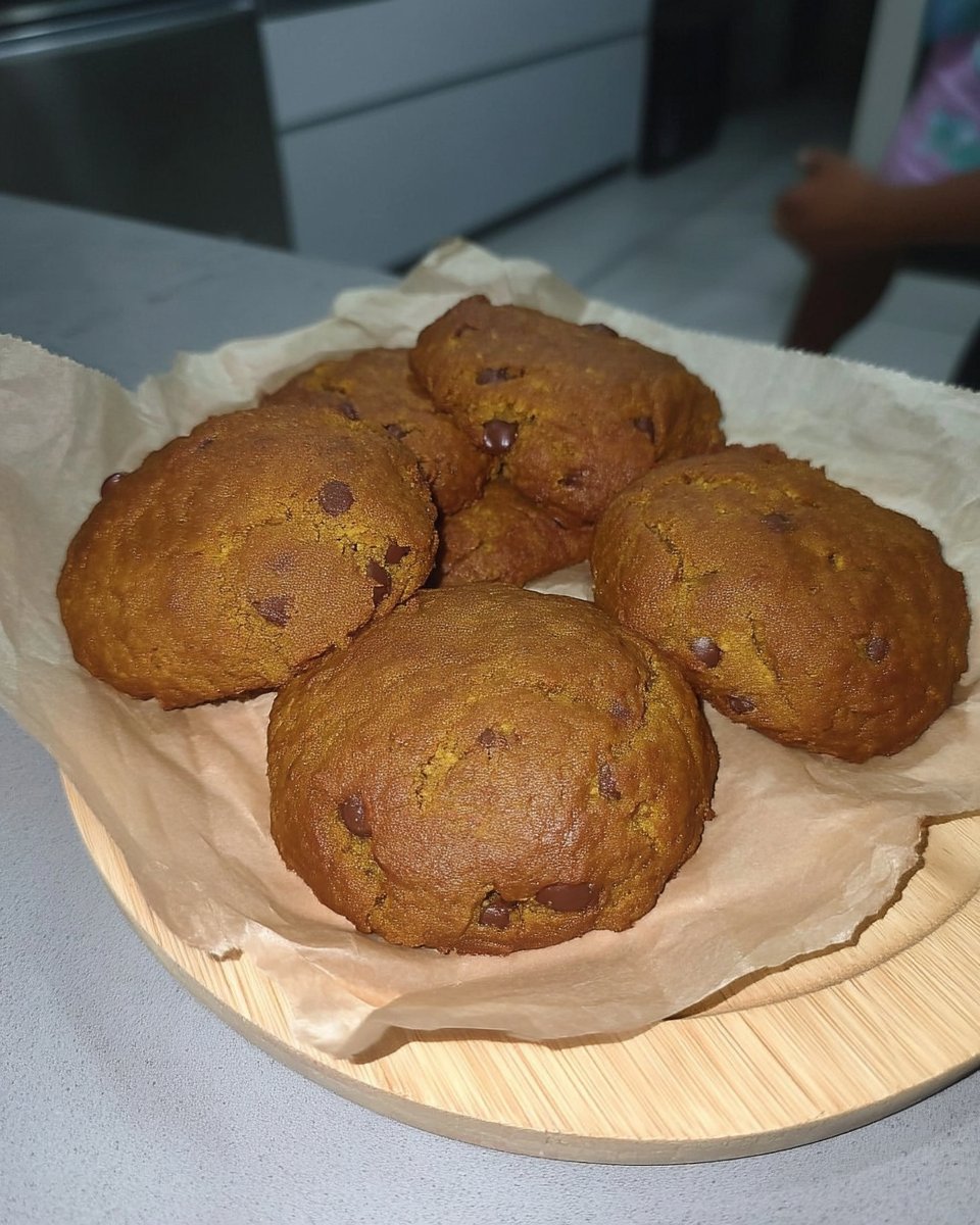Warm crumbl cookie cooling on a wire rack