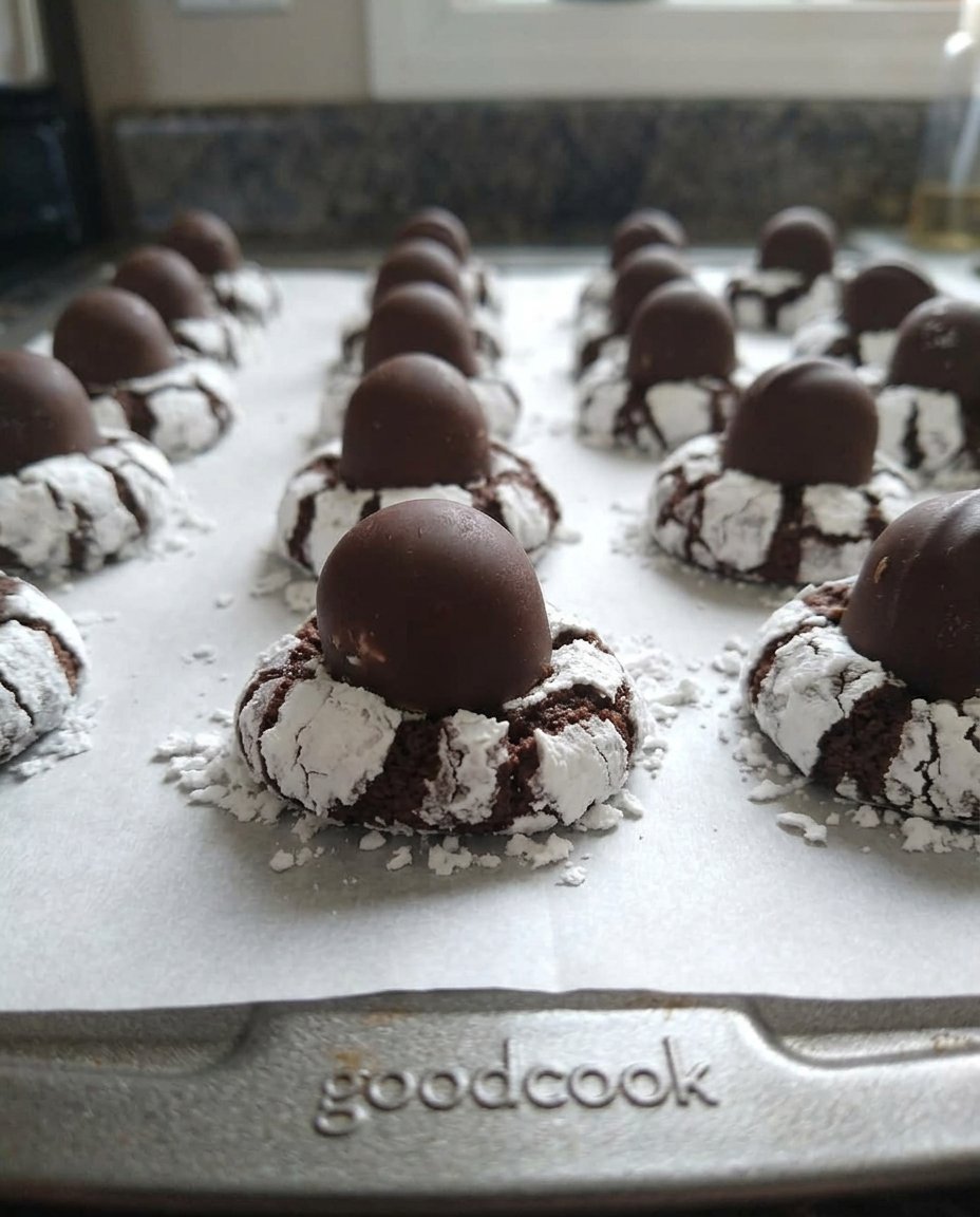 A platter of finished cherry cordial cookies with a delicate white chocolate drizzle