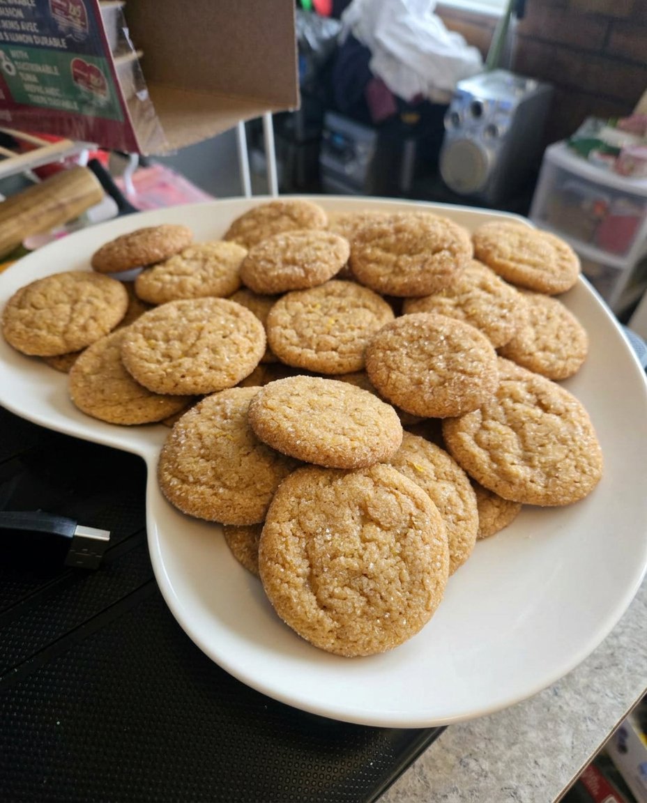 Lemon ginger snaps served with a cup of tea