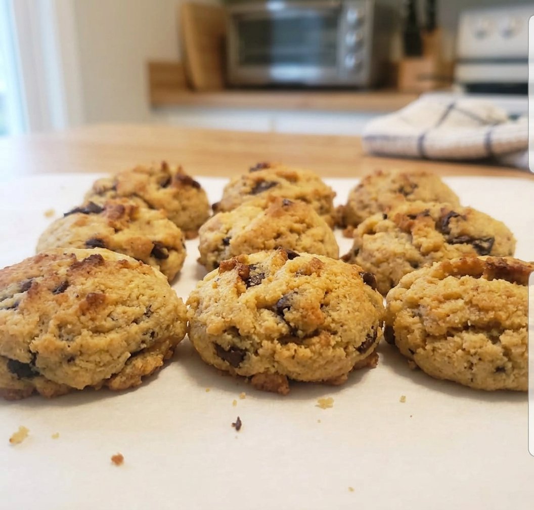 A close up of a paleo chocolate chip cookie showing texture