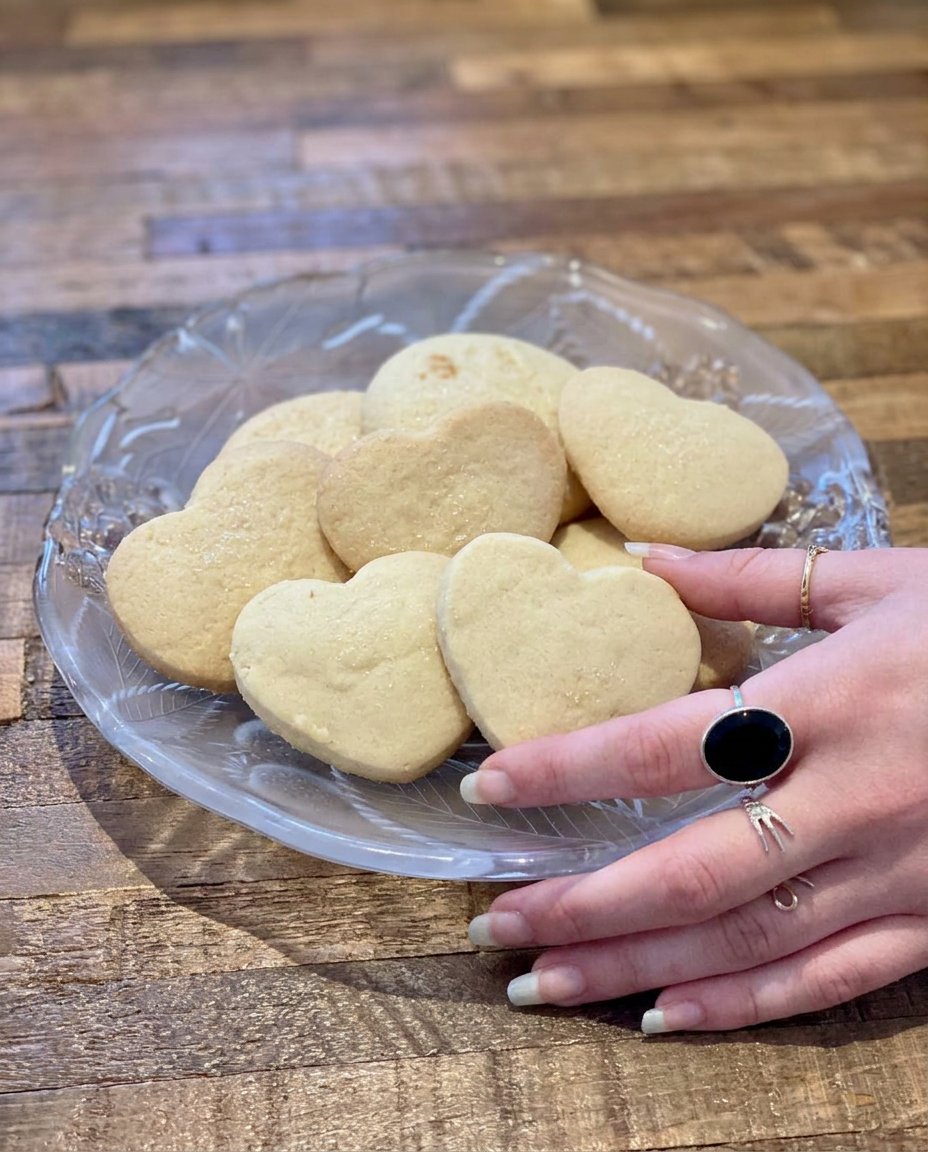 Shortbread cookies dipped in dark chocolate and sprinkled with sea salt.